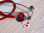 stethoscope and ekg heart tracing